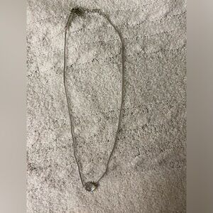 Kendra Scott necklace sliver with an iridescent stone